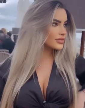 Blonde busty Brazilian escort girl in London Kensington